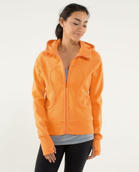 Release Date: 9/2013. Original Price: $108. Materials: Cotton Fleece. Color: orange soda. Why we made this               A deep, lined hood, thumbholes and Cotton Fleece fabric make this sweatshirt our go-to piece when we're wanting to boost our cozy factor. We designed it to be soft and stretchy to increase movability when we're battling the elements.Key features                					the Cotton Fleece fabric has stretch so the hoodie moves everywhere you do					the  deep lined hood and high scub Lululemon Black Friday, Lululemon Outlet, Workout Clothes Lululemon, Scuba Jacket, Lululemon Hoodie, Lululemon Outfits, Lululemon Scuba Hoodie, Scuba Hoodie, Lululemon Scuba