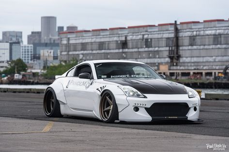 Out Of This World White Nissan 350Z Boasting Rocket Bunny Body Kit — CARiD.com Gallery 350z White, Nissan 350z Wallpapers, White Nissan, Nissan Z Cars, Rocket Bunny, Stanced Cars, R35 Gtr, Japanese Domestic Market, Best Jdm Cars