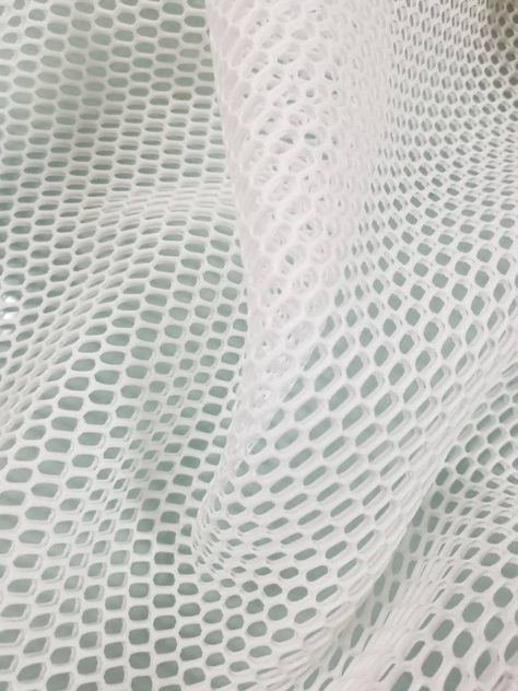 "Neoprene scuba mesh fabric usable for apparel,accessories and interior designing. 58 inches wide. Beautifully made to use for costumes, dance wear, decorations, weddings and much more. Width : 58\" inches Color : Off white Content : 90% Polyester 10% Spandex Thickness: 1.5 mm Thank you for your coming! Please read policy before placing an order. Please contact us via ETSY Conversations for more details. Fabrics are sold by the yard. We will continue length of multiple yards . It will come in on Mesh Aesthetic, Clothing Texture, Fabric Board, Visual Metaphor, Costumes Dance, Cotton Voile Fabric, Material Board, Neoprene Fabric, Cosmetic Display