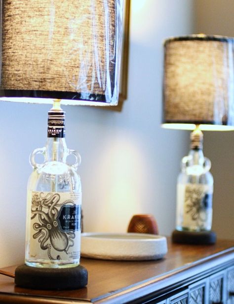 You can easily make a lamp with any cool bottle you like, such as the Kraken Rum Bottle! DIY lamp ideas featured on Completely Coastal. Kraken Bottle Crafts, Bottle Lamp Ideas, Nautical Bottle, Diy Bottle Lamp, Shabby Chic Lamp, Beach Lamps, Kraken Rum, Bottle Lamps, Coastal Table