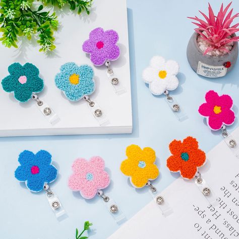 PRICES MAY VARY. Package Content - There are 9 pieces flower shape nurse badge reels in the package, cute and vivid, sufficient quantity can meet your daily use and replacement, you can also share them with your family, friends or colleagues. Quality Material - This kind of cute badge holder is mainly made of quality felt material, durable and reliable, lightweight and soft, not easy to fade or deform, which could maintain for a long time usage. Cute Patterns - These badge reel are designed in f Hospital Nurse, Hippie Flowers, Groovy Retro, Teacher Things, Id Badge Reels, Needle Punch, Felt Material, Nurse Badge Reel, Nurse Badge