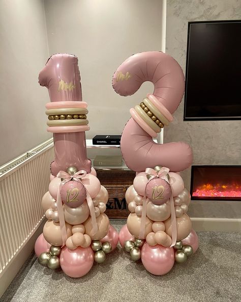 ✨ M I L A I S 1 2 ✨⁣ ⁣ Our premium double digit stacks with girly, grown-up shades of pink ✨⁣ ⁣ #numberstack #numberballoon #luxuryballoons #12thbirthdaydecor #balloonstylist ⁣ ⁣ Luxury balloon artist. Pink tones number balloon stack. Birthday decor. Birthday inspo. Leicester balloon artist. Balloon Number Stacks, Balloon Stack, Balloon Creations, Balloon Artist, 5 Balloons, Balloon Display, Balloon Stands, Birthday Inspo, Silver Numbers