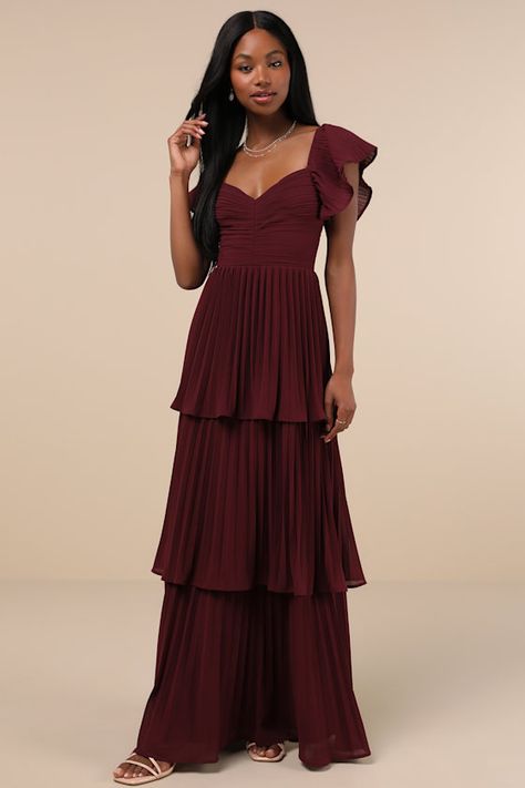 Everyone will instantly notice your sensational sense of style when you strut in wearing the Lulus Notorious Charm Plum Purple Pleated Flutter Sleeve Maxi Dress! Airy, pleated woven chiffon shapes this gorgeous dress that features a lightly gathered bodice with a sweetheart neckline and long sashes that secure atop an otherwise open back, all framed by fluttery short sleeves (with elastic at the shoulders). The high, fitted waist tops a flowy, tiered A-line skirt that cascades down to a ... Long Winter Dress Casual, Wedding Guest Maxi Dress Fall, Dressed To Wear To A Wedding As A Guest, Prom Dresses Flowy Sleeves, Plum Colored Dress, Sweethearts Dance Dresses, Moody Bridesmaid Dresses, Bridesmaid Dress With Sleeve, Light Purple Maxi Dress