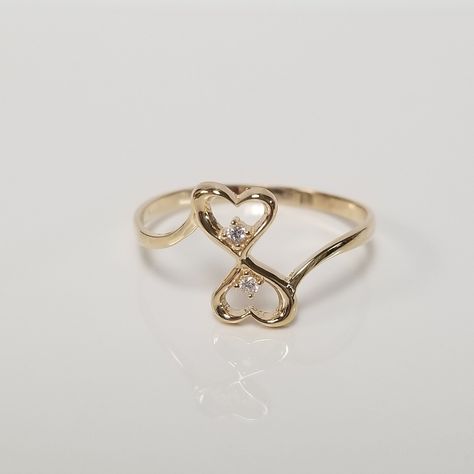 "Thanks for shopping our vintage estate store. We tend to sell well below wholesale and truly hope you enjoy all of our items. Many of the items are one of a kind, so please enjoy scrolling through the pictures and hopefully something will catch your eye. Black spots are from reflections. Estate 14k yellow gold heart to heart cz diamond by pass ring. Cz diamonds are...#JewelryDesign #Fashion #Style #Jewelry #Gemstone #JewelryLovers #Accessories #HandmadeJewelry #JewelryAddict #StatementJewelry Gold Ring Heart, Gold Heart Rings, By Pass Ring, Tulip Ring, Cute Promise Rings, G Ring, Heart Rings, Filigree Heart, Sweet Ring