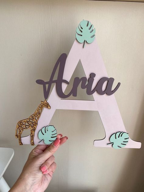 Explore fun farm-themed crafts including wedding birdcages and painted wood designs perfect for creating charming decorations or gifts for special occasions. Door Name Sign, Giraffe Decor, Personalized Wall Decor, Door Plaque, Mdf Crafts, Laser Cut Wood Crafts, Jungle Leaves, Farm Crafts, Animal Nursery Decor