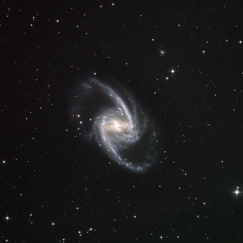 NGC 1365, also known as the Great Barred Spiral Galaxy, is a double-barred spiral galaxy about 56 million light-years away in the constellation Fornax by Loran Hughes Diy Necklace Display, Spiral Galaxy, Necklace Display, Light Year, Astronomy, Constellations