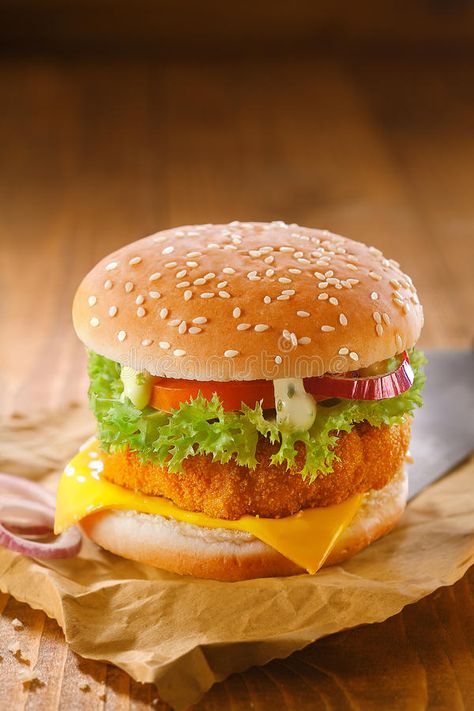 Delicious chicken burger. With a golden crumbed patty and salad ingredients on g #Sponsored , #paid, #PAID, #chicken, #golden, #salad, #burger Chicken Burger Aesthetic, Burger Photo, Patty Food, Chicken Patty, Fried Chicken Burger, Burger And Chips, Yummy Alcoholic Drinks, Chicken Burger, Chicken Patties