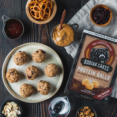 This "Everything But The Kitchen Sink" Protein Balls recipe is perfect for cleaning out the cupboard. Start with your favorite Kodiak Cakes Protein Ball Mix, then add in that last spoonful of nut butter or the stray sunflower seeds you have laying around. Maybe you've got craisins or raisins, or dried apricots you forgot about? Cake Protein Balls, Kodiak Cakes Recipe, Protein Balls Recipe, Blueberry Yogurt Muffins, Banana Zucchini Muffins, Honey Oat Bread, Protein Balls Recipes, Pumpkin Spice Donut, Chocolate Oatmeal Cookies