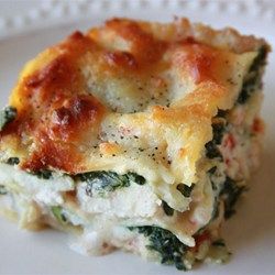 Thick with an abundance of mozzarella, Parmesan and ricotta cheeses, this chicken and spinach lasagna could make you forget all about the tomato kind! Lasagna Alfredo, Recipe Lasagna, Chicken Alfredo Lasagna, Alfredo Lasagna, Meat Lasagna, Lasagna Pasta, Chicken Lasagna, Spinach Lasagna, Alfredo Recipe