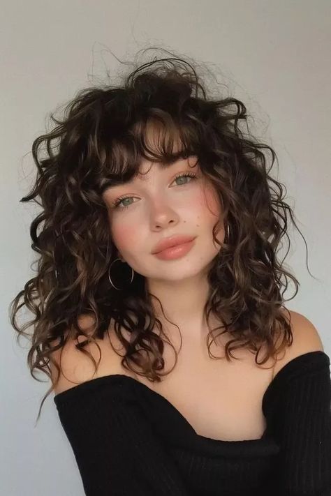 How to Love Your Curls: Top Curly Hair Ideas Curly Hair Bangs For Round Face, Curly Hairstyles Short With Bangs, Bangs On Long Curly Hair, Long Hair Curly Bangs, 2c Curly Hair Haircuts Bangs, Curly Haircut Volume, Wavy Haircut For Round Face, Face Framing Curtain Bangs On Curly Hair, Curly Hair Cuts With Layers And Curtain Bangs Long