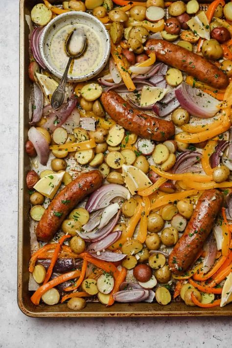 Our quick and simple sheet pan sausage and veggies recipe is a healthy, easy to prepare, 30 minute meal. It's Whole30 compliant and packed with flavor! GF, DF #wellseasonedstudio #sheetpan #sheetpandinner #sheetpanmeal #sausageandveggies #sheetpansausage #italiansausage #spicysausage Sheet Pan Sausage And Veggies, Pan Sausage And Veggies, Sheet Pan Sausage, Pan Sausage, Sausage And Veggies, Italian Chicken Sausage, Sheet Pan Suppers, Sausage And Peppers, Spicy Sausage