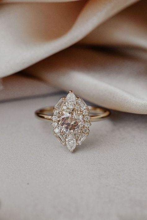 Luxury Vintage Halo Ring With Rose Cut Diamonds, Luxury Rose Cut Diamond Halo Ring For Wedding, Round Diamond And Baguette Ring, Luxury Vintage Halo Ring With Brilliant Cut, Vintage Luxury Halo Ring With Prong Setting, Vintage Engagement Rings Unique Brilliant Earth, Luxury Crystal Engagement Ring With Halo Design, Cluster Engagement Ring With Halo, Luxury Vintage Halo Ring For Wedding