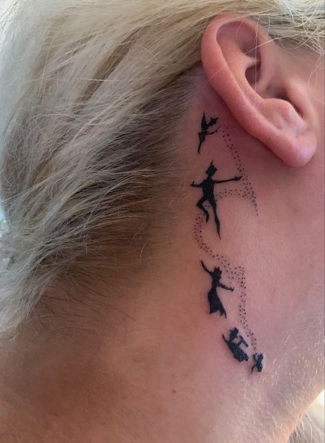 Peter Pan Behind The Ear Tattoo, Peter Pan Tattoo Ideas Inspiration, Small Peter Pan Tattoo, Pan Tattoo, Peter Pan Tattoo, Plane Tattoo, Ear Tattoo Ideas, Ear Tattoos, Mike Tyson