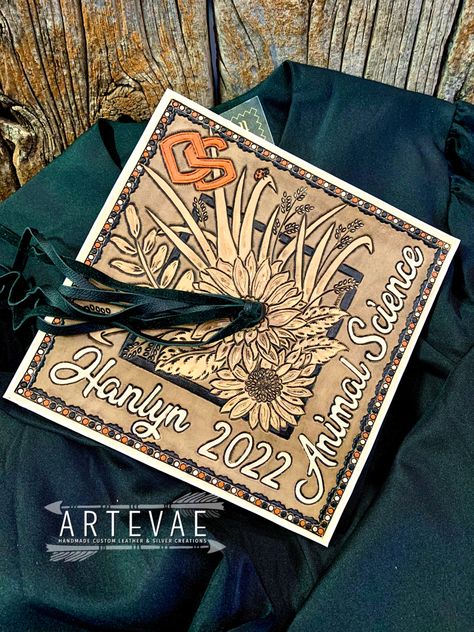 Leather Grad Cap Ideas, Leather Graduation Cap Designs, Tooled Leather Grad Cap, Leather Tooled Graduation Cap, Leather Graduation Cap Ideas, Leather Grad Cap, Leather Graduation Cap, Senior Caps, Grad Hats