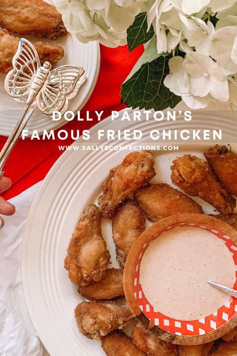 This is a white serving plate full of fried chicken wings. A bowl of white sauce is served along with the fried chicken wings. Dolly Parton Fried Chicken, Dollywood Recipes, Recipe For Fried Chicken, Dolly Parton Recipes, Dolly Pardon, Side Ideas, Food Park, Chili Dogs, Fried Chicken Wings