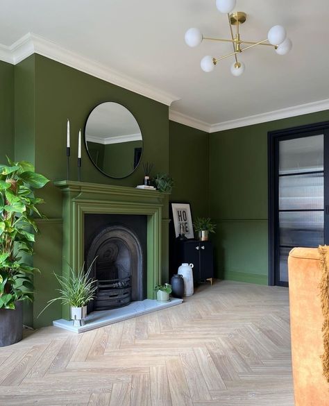 @georginaraineinteriors opts for Olive Colour on her walls, woodwork and fireplace to create a bold look in her living space, paired with… | Instagram White Mantel, Herringbone Floor, Coat Paint, Fireplace Hearth, Open Fireplace, Fireplace Ideas, Fireplace Tile, Types Of Flooring, Fireplace Design