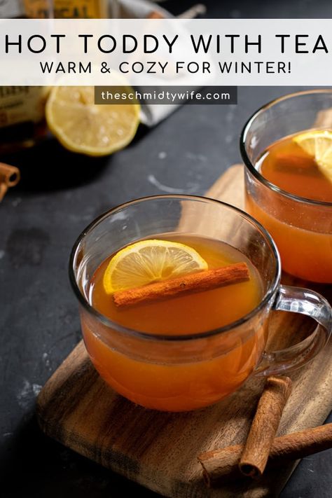 Warm up with this classic hot cocktail, Hot Toddy Recipe with Tea! Known for its cold fighting powers this drink will warm you up and clear your fuzzy head with warm cinnamon, tea, honey, lemons, and whiskey! Recipe | Cocktail | Winter Cocktail | Whiskey | For Colds Hot Toddy Recipe With Tea, Hot Toddy Recipe For Colds, Whiskey For Colds, Hot Toddy Cocktail, Hot Toddy Recipe, Toddy Recipe, Tea For Colds, Hot Toddies Recipe, Hot Cocktails