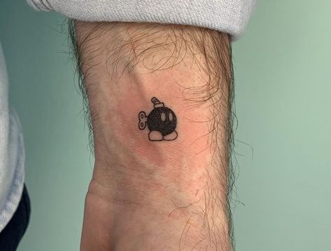 Bobomb Mario Tattoo, Bob Omb Tattoo, Tattoo Comic Style, Super Mario Tattoo, Nintendo Tattoo, 90s Tattoos, Mario Tattoo, Sticker Tattoo, Wynwood Miami