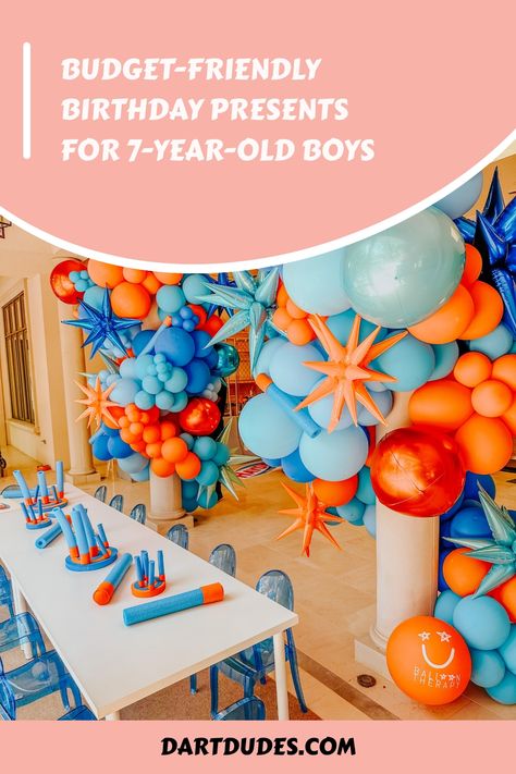 Find the perfect budget-friendly birthday gifts for 7-year-old boys! From toys to games, we've rounded up 6 cheap gift ideas that are sure to impress. Whether you're looking for return gifts for a kid's 7th birthday party or affordable presents for your son's celebration, these options are guaranteed to bring a smile. Explore our curated list of cheap birthday gifts suitable for friends' birthdays or any special occasion. Make shopping stress-free and enjoyable with these great finds! 6 Year Birthday Party Ideas Boy, 7 Year Birthday Party Ideas Boy, 7th Birthday Party For Boys, Cheap Gift Ideas, Cheap Birthday Gifts, 7th Birthday Party Ideas, Nerf Birthday Party, Nerf Darts, Nerf Toys