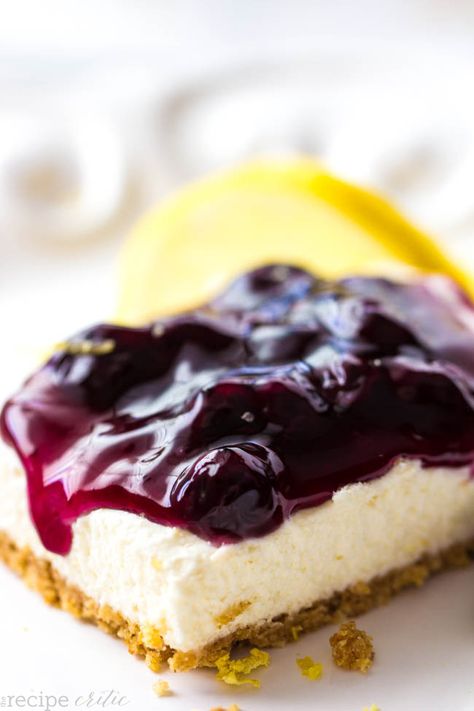 No Bake Lemon Blueberry Cheesecake Bars Lemon Blueberry Cheesecake Bars, No Bake Lemon, Blueberry Cheesecake Bars, Blueberry Cheesecake Recipe, Lemon Blueberry Cheesecake, Cheesecake Bar Recipes, The Recipe Critic, Recipe Critic, Blueberry Desserts