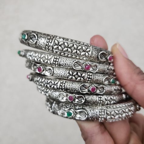 We offer an attractive collection of german silver bangles, These designs are very unique and available in different sizes and designs. It's a great idea to mix and match your bangles with other bangles in my Esty store.  SIzes: 2.4 inner diameter is 2.24 inches; 2.6 inner diameter is 2.33 inches 2.8 inner diameter is 2.53 inches Color, shades, texture displayed may slightly vary from the actual product due to digital image limitations. We request you to consider these minor variations. Please e Classic Silver Jewelry, Bridal Foot Jewelry, Trendy Silver Jewelry, German Silver Jewelry, Bollywood Outfits, Silver Necklace Set, The Bangles, Bangles Indian, Gold Bangles Design