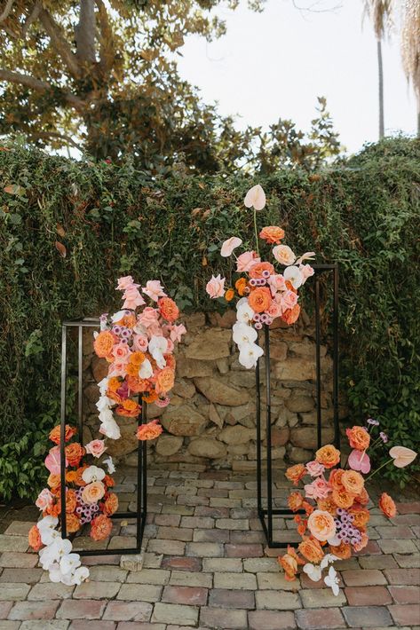 Fun & modern asymmetrical stands as wedding arch with bright florals by New Creations Flower Co, San Diego wedding florist; (Briana Nolan photo) Floral Arch Alternative, Column Ceremony Decor, Floral Backdrops For Weddings, 2024 Wedding Arch Trends, Asymmetrical Arbor Flowers, Flower Alter Wedding Floral Arch, Backdrop Flowers Wedding, Abstract Wedding Florals, How To Make Flower Arch Wedding