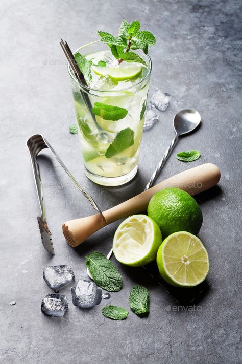 Mojito cocktail by karandaev. Mojito cocktail on dark stone table#karandaev, #cocktail, #Mojito, #table Alcohol Drinks Aesthetic, Aesthetic Alcoholic Drinks, Aesthetic Drinks Alcohol, Drinks Aesthetic Alcoholic, Alcohol Background, Mojito Recipe Classic, Background Bar, Citrus Cocktail, Drinks To Make