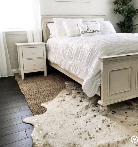 Cow Rug Bedroom, Layered Cowhide Rug, Cowhide Bedroom, Cowhide Rug Bedroom, Cowhide Rug Living Room, Rug Under Bed, Cowhide Decor, Faux Cowhide Rug, Rental Home Decor