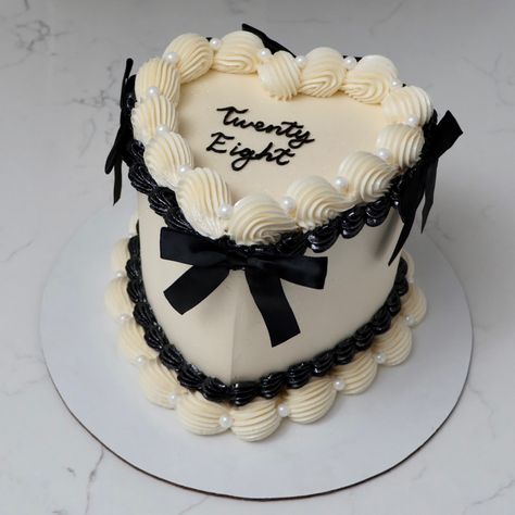 Twenty Eight 🖤🎀 - Cake Details - Size: Mini 6” (two layers) serves ~4-6 Add-ons: Bows (not edible) + pearls (edible) + glitter dust (edible) #emmacakes #customcakes #seattle #seattlecakes #heartcake #vintagecakes Black And White Heart Cake, Black And White Theme Cake, Personal Cakes Mini, White Layer Cake, 28th Birthday Cake, Edible Glitter Dust, Sparkle Cake, 25th Birthday Cakes, White Birthday Cakes