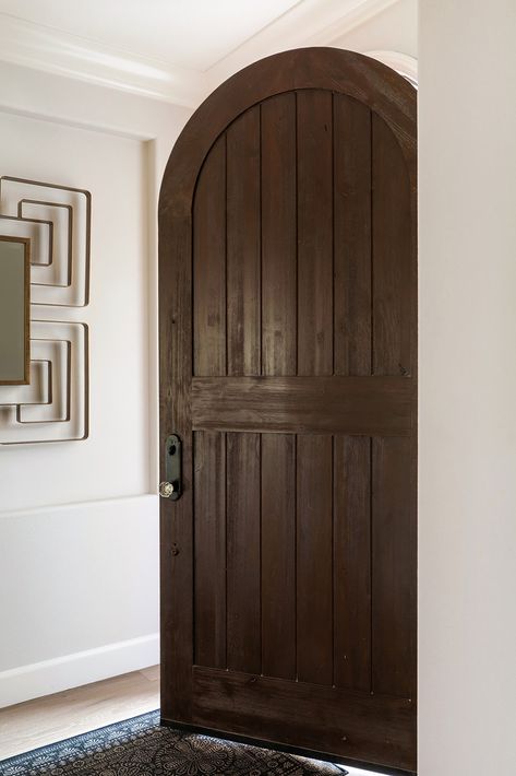 A door that brings the drama! Dark wood with an archway? What could be dreamier? Dark Wood Interior Doors, Dark Brown Door, Dark Interior Doors, Boy Room Accent Wall, Recessed Shower Shelf, Grey Ceiling, Los Angeles Interior Design, Newly Remodeled Kitchens, Room Accent Wall