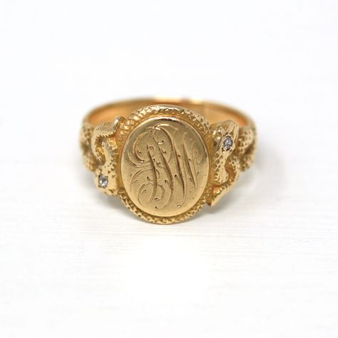 Gorgeous antique dated 1904 Edwardian era 14k yellow gold signet ring! This incredible antique ring features cursive style initials on the ring face (looks like JPW but could be interpreted differently, and has incredible snake motifs on the shoulders. The inside of the ring is lovingly engraved "1904" and the snake heads are embellished with diamonds. A fabulous piece of fine antique dated jewelry! ERA - Dated 1904 - Edwardian Era METAL / MATERIAL - 14k yellow gold, two diamonds (.03 ctw) MARKI Snake Heads, The Ring Face, Rare Jewelry, Engraved Initials, Logo Gifts, Gold Signet Ring, Gold Engraving, Initial Ring, Edwardian Era