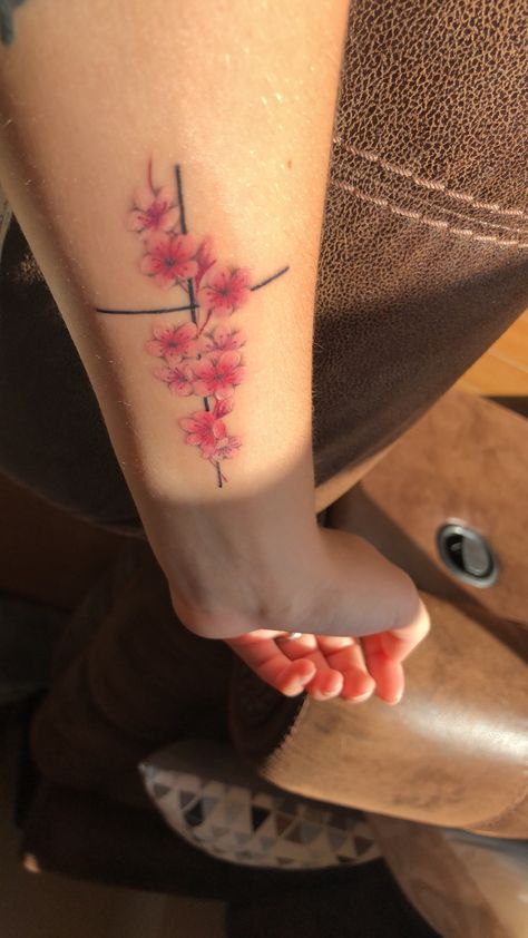 #flowers #cherry #blossoms #cherryblossoms #cross #christian #christiantattoo #tattoo #delicate #pink #japan #okinawa #arm #wrist #small Cross With Cherry Blossom Tattoo, Okinawa Tattoo Ideas, Cross With Flowers Tattoo, Japan Tattoos, Okinawa Tattoo, Pink Flower Tattoos, Pink Japan, Japan Okinawa, Flower Tattoo Drawings