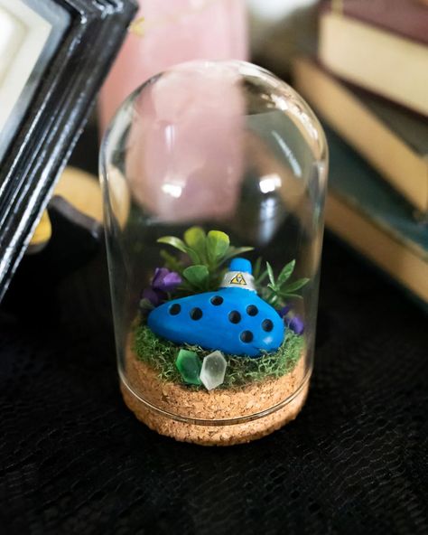 ✨Legend of Zelda Ocarina Mini Terrarium ✨ See all available pokémon taxidermy, terrariums, prints, oddities, and more on our website and Etsy! Link in bio 🖤 #loz #videogameart #legendofzelda #ocarinaoftime #zelda #oddities Zelda Diorama, Mini Terrarium, Horizon Zero Dawn, Ocarina Of Time, In A Jar, Taxidermy, Legend Of Zelda, Terrarium, Link In Bio