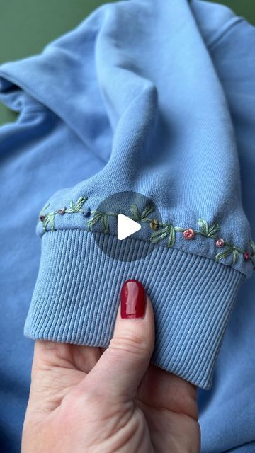 Jenny ~ Embroidery Art, Design & Crafts on Instagram: "I just love these little cuff details! What do you think? 💙 . . #upcycledclothing #upcycledfashion #knitwear #embroideredclothing #embroidereddenim #embroideredclothes #embroideredflorals #learntoembroider #mindfulart #slowstitching #sewingproject #embroiderypatterns #bordadolivre #createdtocreate #diycrafts #slowcraft #dmcthreads #dmcembroidery #springflowers #embroiderydesign #beginnerembroidery #embroiderywork #denimembroidery #sustainablefashion #embroiderhappyhoops #embroiderytutorial #embroideryprocess #embroideryproject #handsew" Embroidery Pants, Denim Embroidery, Learning To Embroider, Hand Embroidery Design Patterns, Upcycled Fashion, Slow Stitching, Cuff Detail, Embroidered Clothes, Hand Embroidery Design