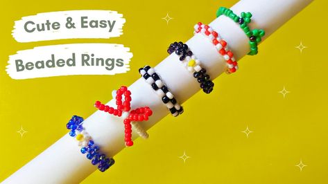 Learn how to to make cute beaded rings in this video on my YouTube channel.. I am making a cute Beaded Bow Ring , Beaded flower ring, checker ring , and Cute frog ring ... Diy Bead Flower, Bead Flower Ring, Beaded Frog, Rings Tutorial, Frog Ring, Beaded Bow, Bead Rings, Diy Beaded Rings, Ring Tutorial