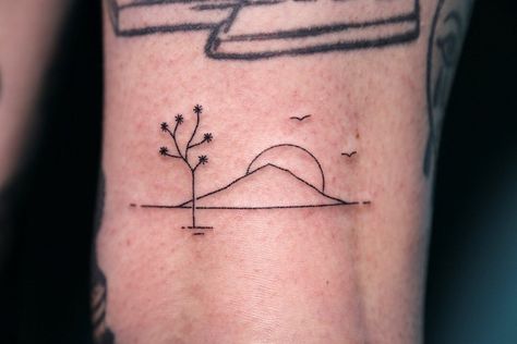 Permanent Friends ™️ on Instagram: “Joshua Tree sunset on the back of the knee for Rachel. By @blackscraps done at @permanent.friends.” Fine Line Joshua Tree Tattoo, Small Joshua Tree Tattoo, Desert Sunset Tattoo, Joshua Tattoo, Joshua Tree Tattoo, Joshua Tree Sunset, Cactus Tattoos, Wind Tattoo, Friends Tattoo