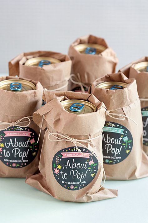 CafeMom.com : Custom Soda Pop Party Favor : 40 Adorable DIY Baby Shower Favors That Are Budget Friendly -- Give guests a can of soda pop to take home with a cute note attached so they can cheer to the happy news that the baby has arrived. Baby Shower Favor Ideas, Perlengkapan Bayi Diy, Bos Baby, Easy Baby Shower, About To Pop, Bebe Shower, Baby Shower Favors Diy, Babyshower Party, Baby Shower Labels