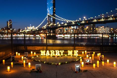 Candlelight proposal with the Brooklyn Bridge on the background | Proposal Ideas and Planning Candlelight Proposal, Bridge Proposal, Places In New York, Manhattan Skyline, Skyline View, Washington Street, Marriage Proposals, Proposal Ideas, Pebble Beach