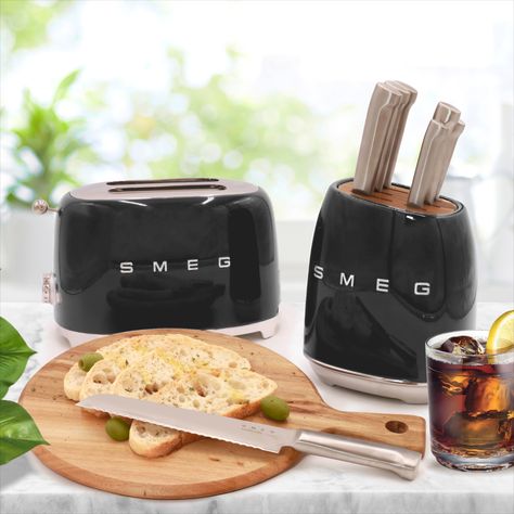 🎉 Slice and Dice with SMEG Knives - Celebrate National Knife Day! 🎉 🔪 Razor-sharp blades for effortless slicing. 🔪 Perfect balance for ultimate control and comfort. 🔪 Elegant design to complement your kitchen aesthetic. 👉 Tap the link in our bio to discover more about SMEG Knife Block Set. #smeg #smeglovers #techwithstyle #NationalKnifeDay #SliceWithStyle #KitchenGoals #kitchendesign #home Smeg Knife Block, Smeg Kitchen Appliances, Kitchen Appliance Set, Smeg Kitchen, Domestic Appliances, Wood Knife, Kitchen Aesthetic, Pretty Kitchen, Knife Block Set