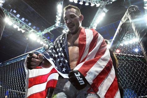 Ahead of his vacant UFC lightweight title challenge in the main event of UFC 262 on May 15. — ‘Iron’ Michael Chandler has claimed that he likes the recently floated idea of ‘The McGregor Belt’ as well as calling for the title to be created in time for its first defence ahead of a projected […] Conor Mcgregor Belts, Justin Gaethje, Michael Chandler, Daniel Cormier, Sport Icon, Conor Mcgregor, Combat Sports, Main Event, Kickboxing