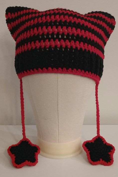 This hat is handmade by me and is made of 100% acrylic yarn. This hat fits most adult sized heads. Red Crochet Hat, Crochet Red Yarn, Fun Crochet Hat, Cat Crochet Hat, Crochet Bts, Cat Hat Crochet, Crochet Bunny Hat, Black And White Crochet, Crochet Cat Hat