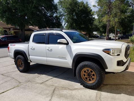 White Tacoma, Tacoma Wheels And Tires, White Tacoma Black Rims, Bronze Rims On Truck, Toyota Tacoma White, Grey Tacoma, Tacoma Wheels, 4runner Bronze Wheels, 2000 Toyota Tundra