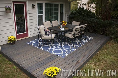 DIY Concrete Patio Cover-Ups • Lots of Ideas & Tutorials! Including this diy stained deck project (done over existing concrete patio) from 'view along the way'. Diy Patio Ideas, Diy Concrete Patio, Concrete Patio Makeover, Concrete Deck, Cement Patio, Concrete Patios, Cheap Patio, Diy Deck, Patio Makeover