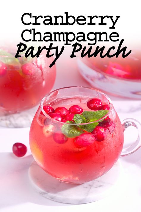 A festive adult drink that's great for a crowd. This easy Cranberry Champagne Party Punch comes together in minutes and is sure to delight. #cranberrypunchrecipe #holidaypunchrecipe #partypunch Poinsettia Punch Recipe Champagne, Champagne And Cranberry Juice, Christmas Champagne Cocktails For A Crowd, Christmas Party Cocktails For A Crowd, Champagne Punch New Years, Winter Party Food For A Crowd, Champagne Punch Recipes Easy, Christmas Party Drinks Alcohol For A Crowd, Holiday Champagne Punch