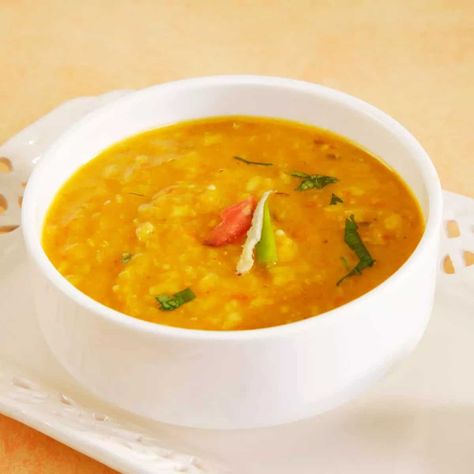 Moong dal cooked with spices in Himachali style Dal Shorba Recipe is a healthy lentil soup that can be prepared in less time with ingredients available at home. It is very comforting in winters and packed with proteins. It is best served as appetizer with croutons or bread sticks. Moong Dal Soup Recipe, Moong Dal Chila Recipe, Massor Dal Recipe, Shorba Recipe, Yellow Moong Dal Recipe, Moong Masoor Dal Recipe, Red Chili Powder, Breadsticks, Chopped Garlic