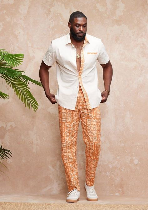 Men’s African Outfits, Men Nigerian Outfit, African Button Down Shirt Men, Adire Shirts For Men, Mens Orange Outfit, Men’s Resort Wear, Adire Styles For Men, Mens Resort Wear Outfits, Black Men Vacation Outfits