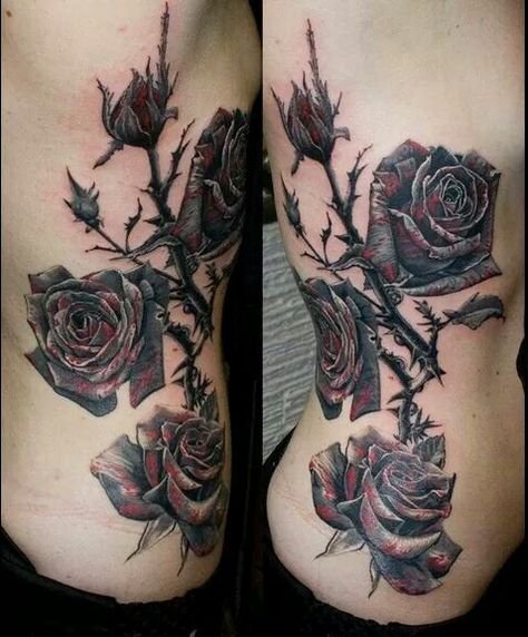 Black with a hint of red roses = epic Cross Rib Tattoos, Rose Thorn Tattoo, Rose Rib Tattoos, Rose Vine Tattoos, Dark Roses Tattoo, Black Rose Tattoo, Thorn Tattoo, Rose Tattoo Thigh, Catrina Tattoo