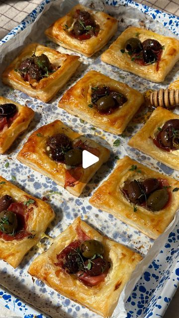 casey cheek on Instagram: "Goat Cheese, Olive, & Prosciutto Puffs 🫒🍂

If you’re looking for that perfect fall appetizer to complete your table, look no further than these Olive, Goat Cheese, & Prosciutto Puffs. I like to use @pearls_olives and the prosciutto to balance the sweetness of the honey and goat cheese. 

These pastry puffs are the perfect simple, but fancy-looking dish for now and also all of your holiday entertaining!

Ingredients (Makes 15):
1 cup Pearls Specialties Pitted Medley Olives
1 puff pastry sheet
8 oz goat cheese
2 tbsp hot honey + more to drizzle
2 tbsp olive oil
6 slices prosciutto 
1 egg 
1 tbsp water 
Fresh thyme

Directions:
1. Preheat oven to 425 F. 
2. Sprinkle a little flour on the puff pastry sheet and roll out any creases. Make sure the puff pastry is stil Goat Cheese Olive And Prosciutto Puffs, Puff Pastry Prosciutto, Puff Pastry Cheese Appetizers, Goat Cheese Prosciutto, Mom Lunch, Yellow Packaging, Fall Appetizer, Phyllo Recipes, Cheese Puff Pastry