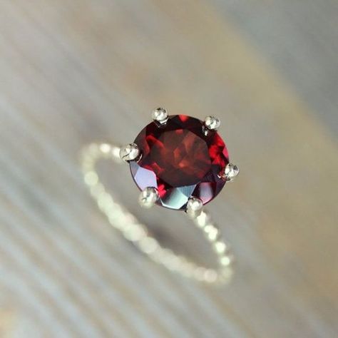 Stun with this red garnet + recycled gold engagement ring. Recycled Gold Ring, January Birthstone Rings, Garnet Engagement Ring, Red Garnet Ring, Crimson Red, Garnet Ring, Garnet Rings, Recycled Gold, Red Garnet