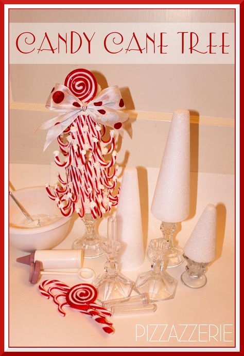 Here’s What You Need:  * Styoform tree cone  * Candle holder – glass works well  * Floral tubes, found at craft stores  or at your local Florist  * Glue  * Recipe for Royal Icing Glue (you can find it on this post!)  * Two sizes of candy canes and  one big festive lollipop (for the top)  * Christmas ribbon Diy Candy Cane, Candy Cane Tree, Candy Centerpiece, Candy Centerpieces, Candy Crafts, Topiary Trees, 12 December, Diy Candy, Christmas Goodies